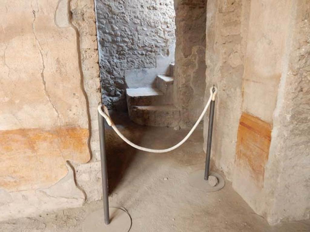 VI.8.23 Pompeii. May 2017. Looking north through doorway at east end of north wall towards stairs in VI.8.24.  Photo courtesy of Buzz Ferebee.
