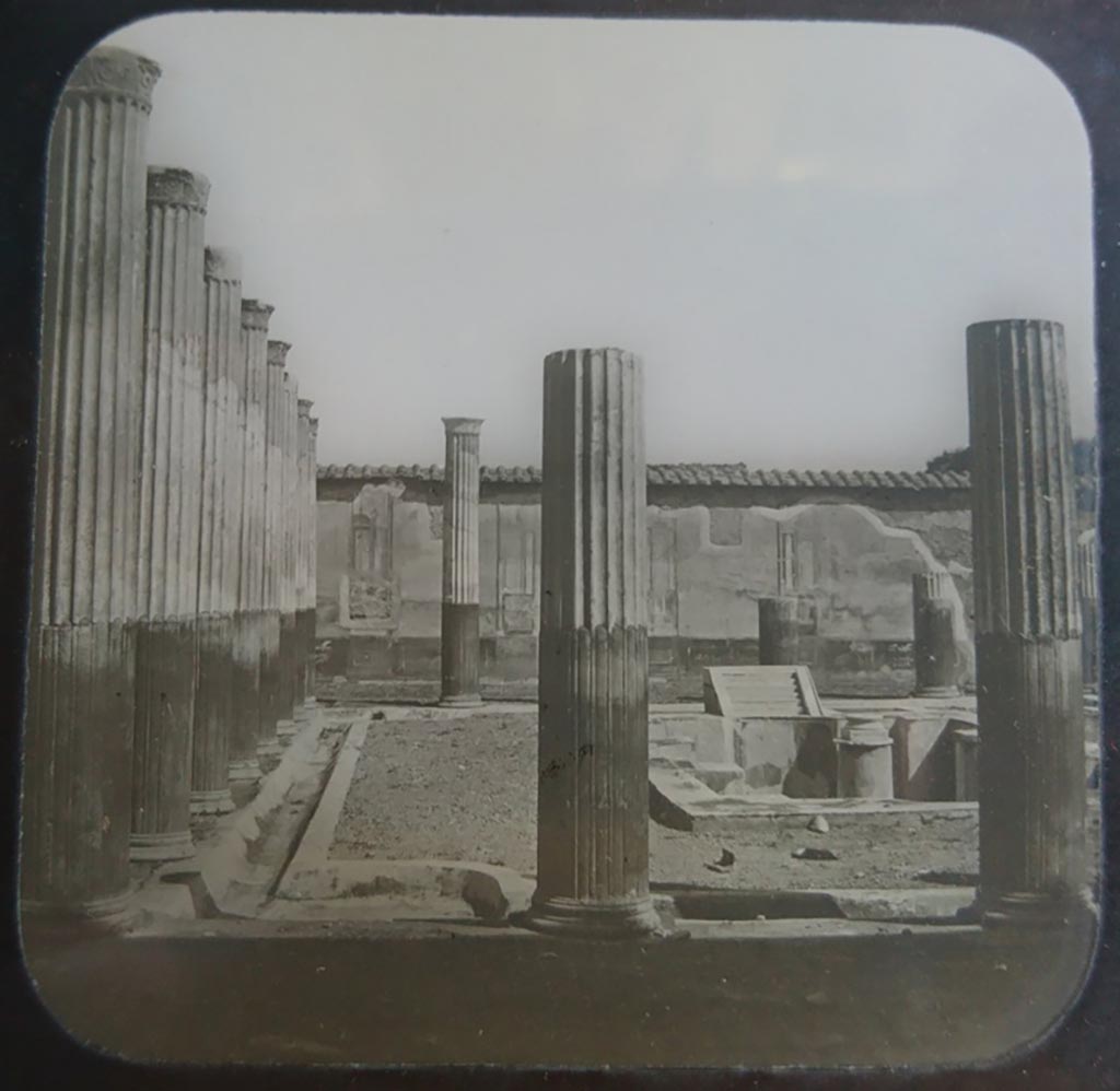 VI.9.2 Pompeii. c.1900. C. and G. Lantern slide published by A. Laverne. Peristyle 16, looking west across south end.  