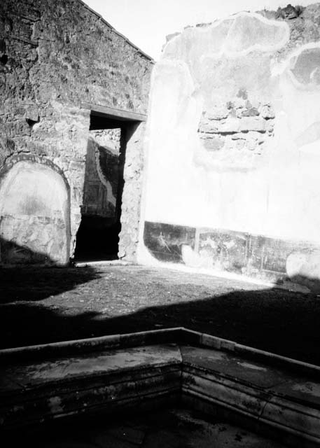 VI.9.2 Pompeii.  Atrium with impluvium and table. Looking north to peristyle 16.  Old undated photograph, Courtesy of Society of Antiquaries. Fox Collection.