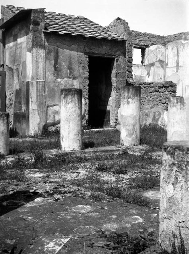 VI.9.6 Pompeii. W.814. Room 3, looking north-west across impluvium in atrium, towards doorway to room 16. The fauces/entrance corridor from the main entrance is on the left.
Photo by Tatiana Warscher. With kind permission of DAI Rome, whose copyright it remains. 
See http://arachne.uni-koeln.de/item/marbilderbestand/231049 
