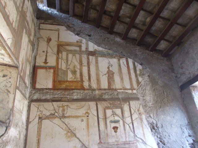VI.9.6 Pompeii.  March 2009.  Room 16.  North wall.  Painted figure.