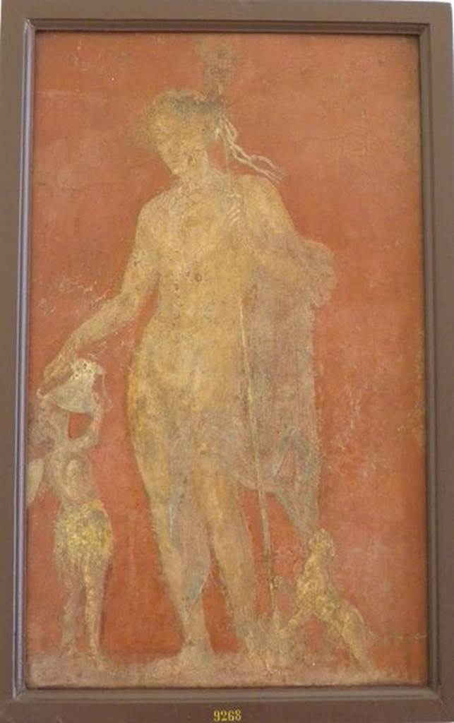 VI.9.6 Pompeii.  Found on 1st July 1828.  Wall painting of Dionysus or Bacchus with panther to his left and a Cantharus in his right hand from which a satyr is drinking.   One of various painted figures found on the walls of the atrium. See Helbig, W., 1868. Wandgemälde der vom Vesuv verschütteten Städte Campaniens. Leipzig: Breitkopf und Härtel. (400). Now in Naples Archaeological Museum.  Inventory number 9268.