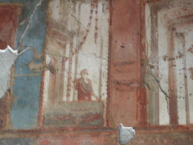 VI.9.6 Pompeii. May 2006. Room 8, painted figures and naval scene, from the upper north wall.