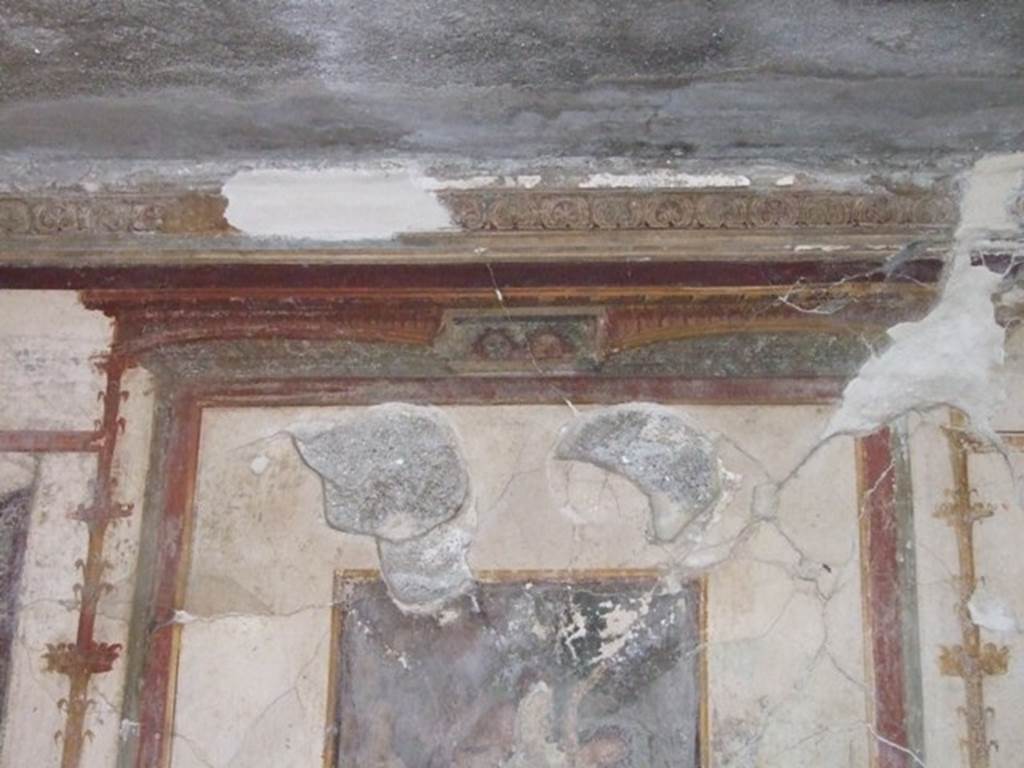 VI.9.6 Pompeii. March 2009. Room 21, upper part of west wall with decorative stucco.