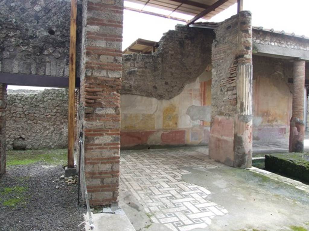 VI.9.6 Pompeii. March 2009. Room 22, looking south towards doorway to room 24 on left, and mosaic floor of peristyle on right.
