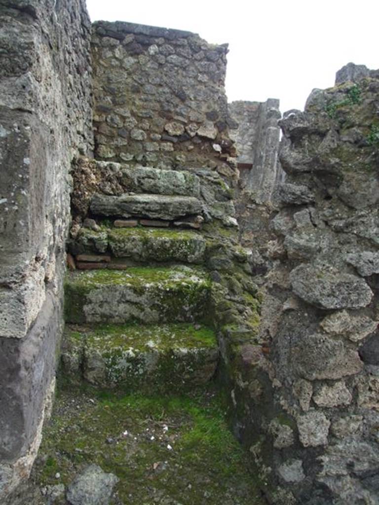 VI.10.4 Pompeii.  March 2009.  Staircase to upper floor on south side of atrium.