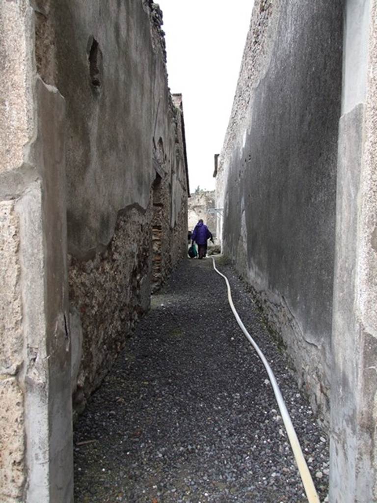 VI.11.9 Pompeii. December 2006.  
Long corridor 15 leading to servants quarters, bakery and small baths area.

