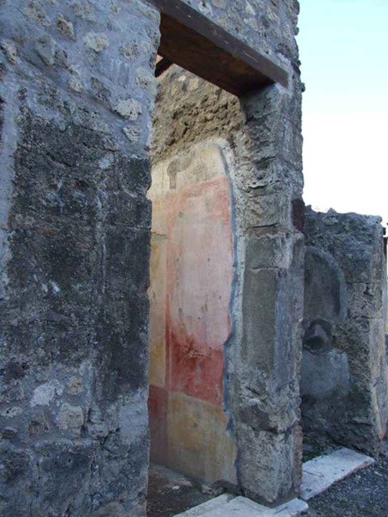 VI.11.10 Pompeii. December 2007. Doorway to room 29, looking north-west into cubiculum.  