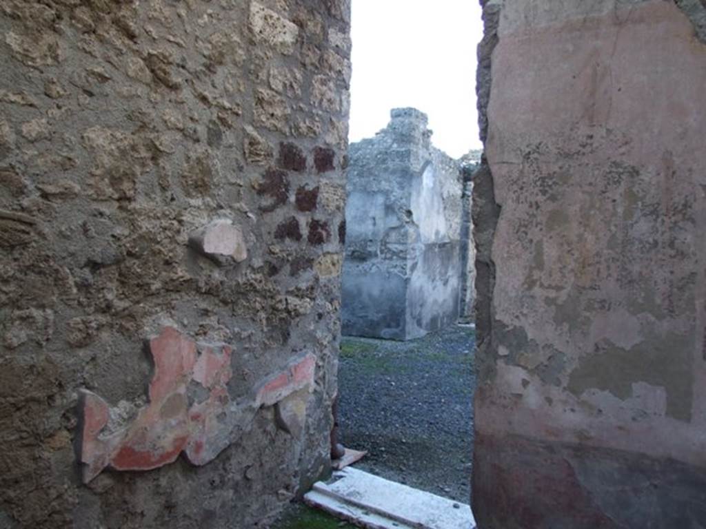 VI.11.10 Pompeii. December 2007. Room 29, west wall. Looking through other doorway into atrium 3 of VI.11.9.

