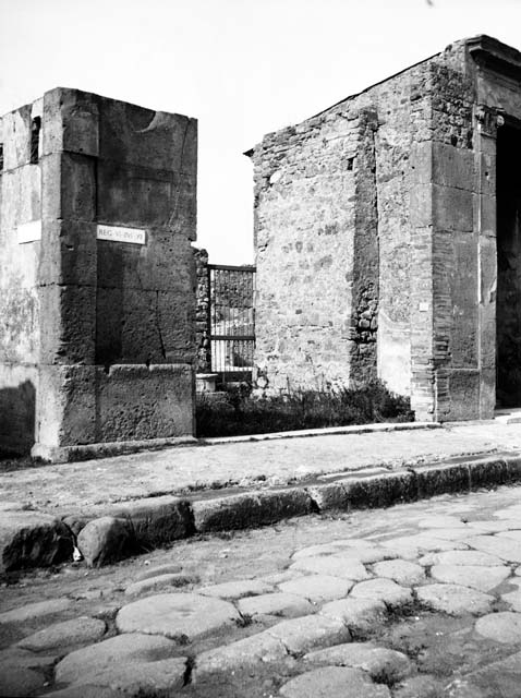 VI.12.1 Pompeii. March 2009. Pilaster on east side of entrance of shop, separating from VI.12.2. For graffiti found on this pilaster, see VI.12.2.