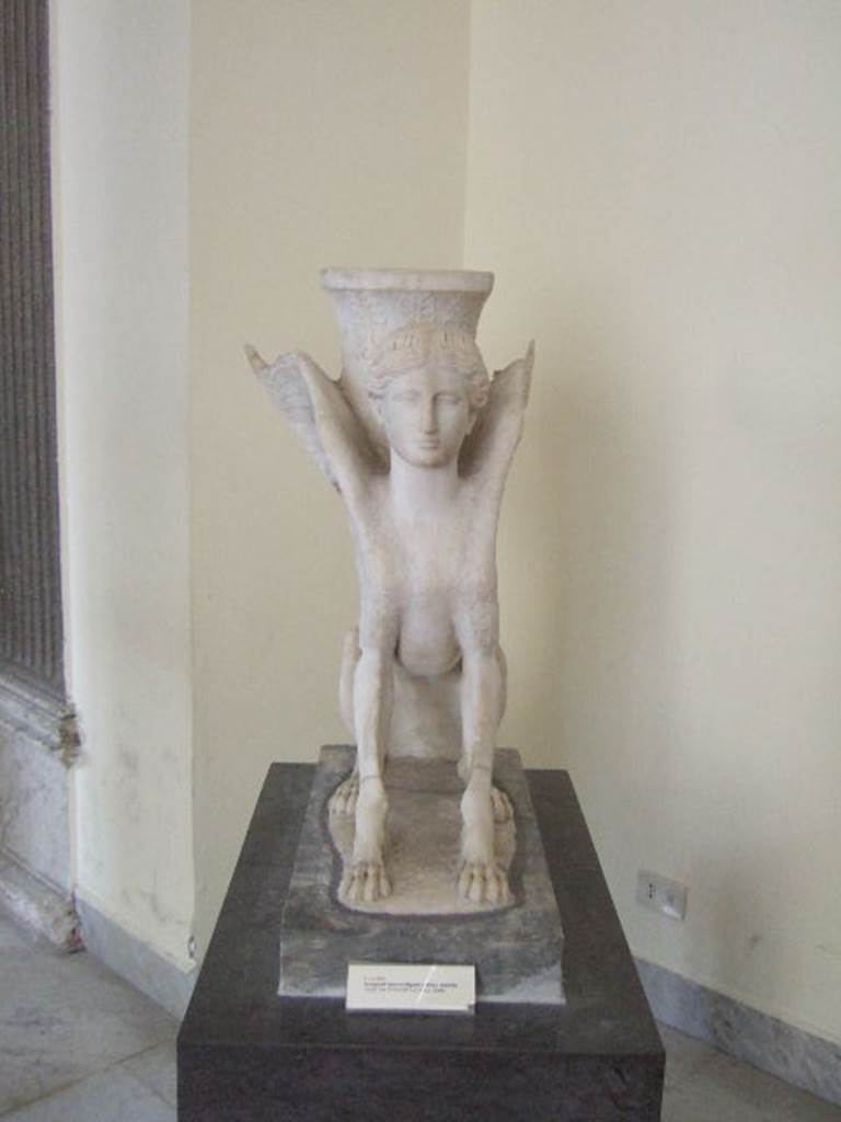 VI.12.2 Pompeii. Marble table support in the form of a sphinx. Found in second peristyle.  Now in Naples Archaeological Museum. Inventory number 6869.