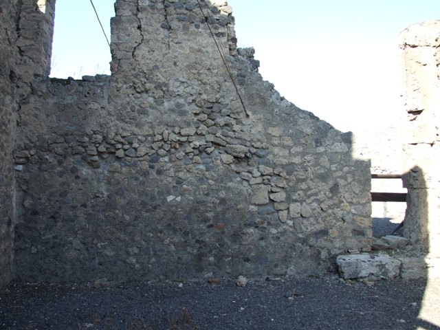 VI.12 Pompeii. December 2004. Vicolo del Labirinto, looking north. VI.13.1 exterior side wall.