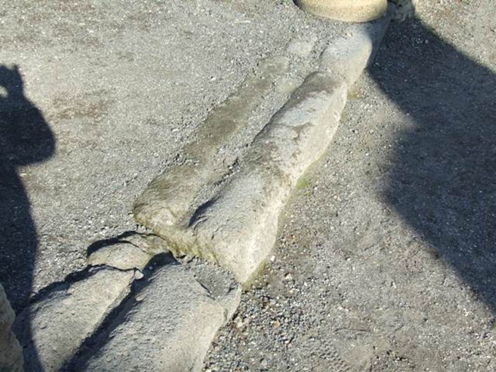 VI.14.1 Pompeii. December 2007. Threshold or sill at front of caupona with groove for sliding doors.