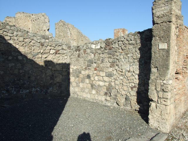 VI.14.14 Pompeii. December 2007. North wall of shop.