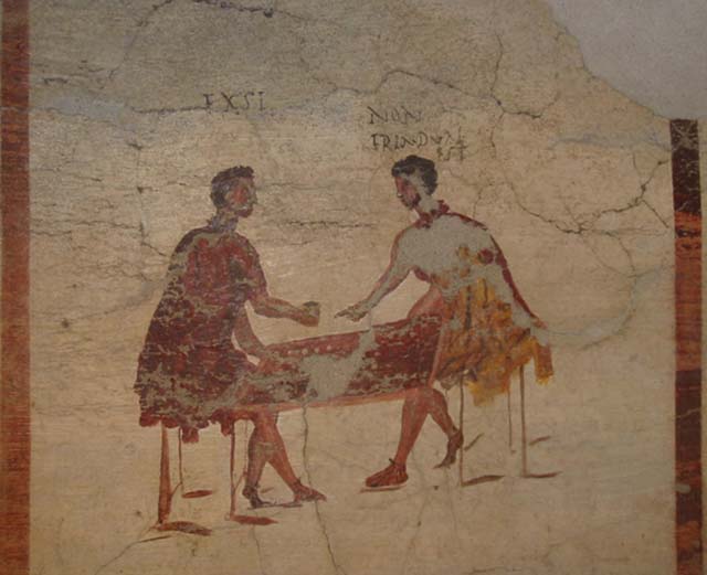 VI.14.35/36 Pompeii. Fresco of a scene of conflict (damaged), from the north wall. 
Now in Naples Archaeological Museum.  Inventory number 111482.
According to Berry, the men fight and the innkeeper tells them to leave. 
Above his head are the words “Go on, get out of here! You have been fighting”!
See Berry, J., 2007. The Complete Pompeii. London, Thames & Hudson, (p.231-2)

According to Epigraphik-Datenbank Clauss/Slaby (See www.manfredclauss.de), these are part of CIL IV 3494;

Noxsi(!)
Ame
Tria
eco(!)
fui

Or(o) te fellator
eco(!) fui 

Itis
Foras
rixsatis(!)      [CIL IV 3494 part]
