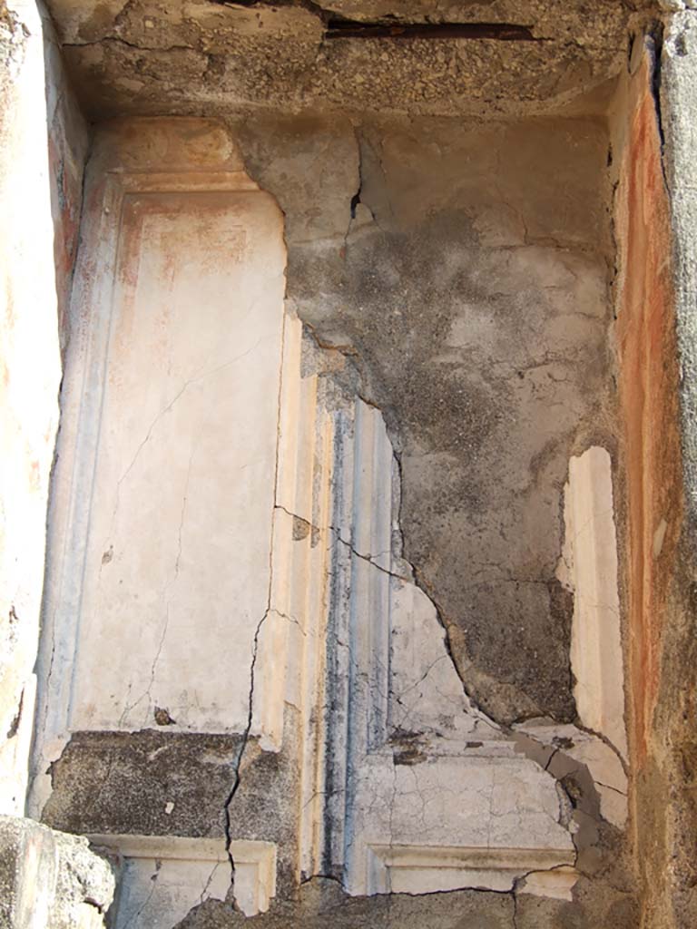 VI.14.43 Pompeii. December 2007. Room 5, remains of patterned floor in room on north side of atrium.  According to Bragantini, the floor was formed of cocciopesto with white tesserae dots.
See Bragantini, de Vos, Badoni, 1983. Pitture e Pavimenti di Pompei, Parte 2. Rome: ICCD. (p.300, ambiente ‘8’)
