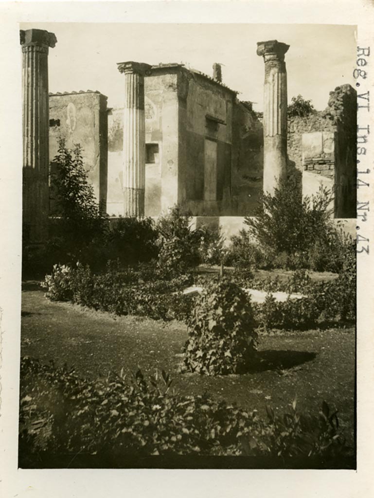 VI.14.43 Pompeii. Pre-1937-39. Looking across peristyle towards room 16 with painted decoration on west wall.
Photo courtesy of American Academy in Rome, Photographic Archive. Warsher collection no. 1429.


