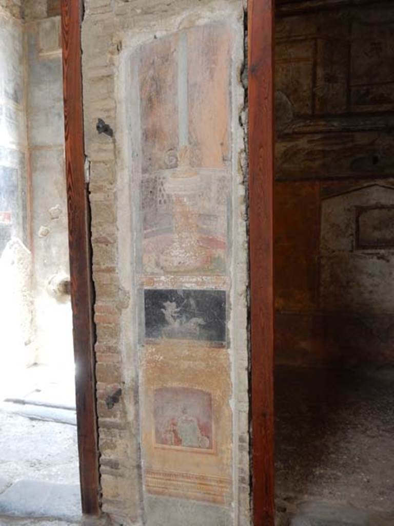 VI.15.1 Pompeii. May 2017. Detail of painting in atrium and doorway to bedroom on left of main entrance. Photo courtesy of Buzz Ferebee.
