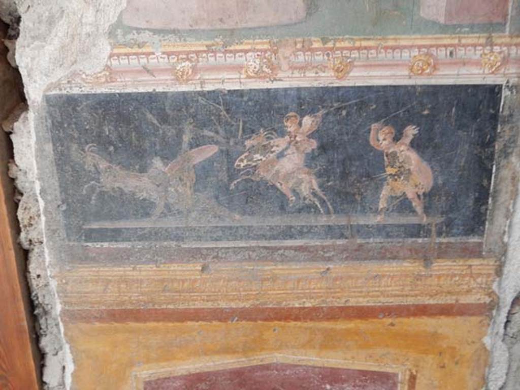 VI.15.1 Pompeii. May 2017.  Detail of painting in atrium between doorways to bedroom on left of main entrance and oecus on south side, after restoration.
Photo courtesy of Buzz Ferebee.
