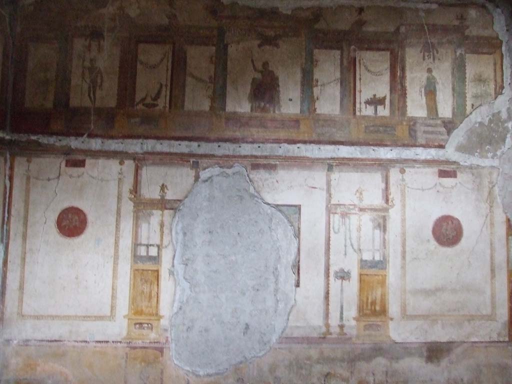 VI.15.1 Pompeii. December 2006. Upper west wall in oecus on south side of atrium.