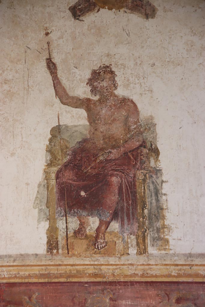 VI.15.1 Pompeii. October 2023. 
Upper centre of west wall of oecus, detail of painted figure of Zeus. Photo courtesy of Klaus Heese.
