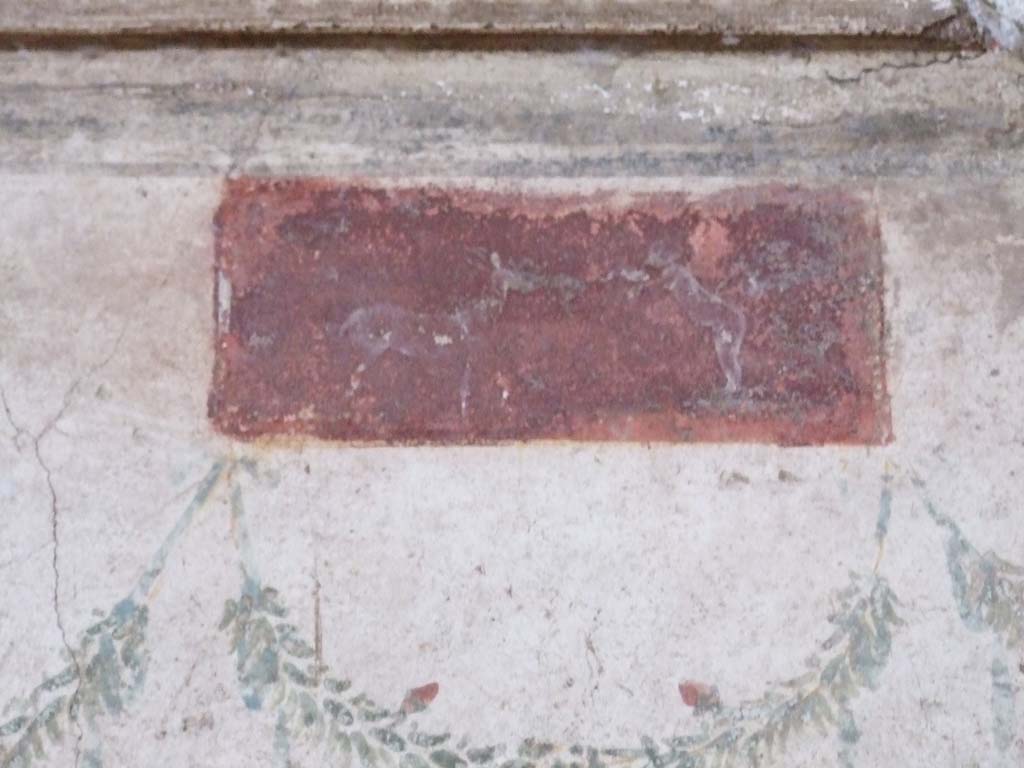 VI.15.1 Pompeii. December 2006. Detail of decorative panel from north end of west wall in oecus on south side of atrium.
