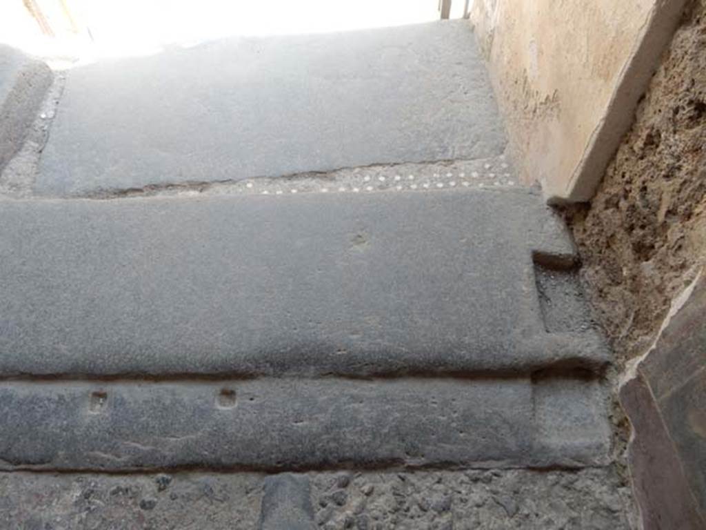 VI.15.1 Pompeii. May 2017. Threshold of entrance doorway from south side. Photo courtesy of Buzz Ferebee.