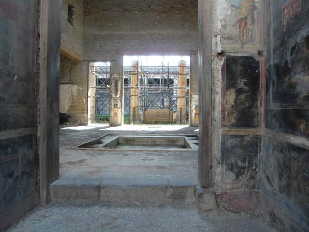 VI.15.1 Pompeii. May 2012. Looking west from vestibule (a) across atrium towards peristyle.
Photo courtesy of Buzz Ferebee.
