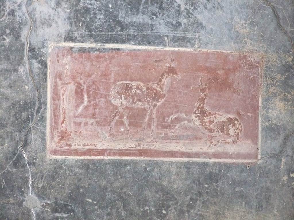 VI.15.1 Pompeii. December 2006. Painting in vestibule from north wall. According to Sogliano, the two black panels on the north wall also contained a small rectangular panel on a red background. This showed two deer and an idol placed on a pedestal. 
Sogliano, A: La Casa dei Vettii in Pompei, 1898, (p.237)
