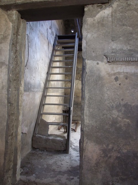 VI.15.9 Pompeii.  March 2009.   Atrium.  Reconstructed modern staircase to upper floor.