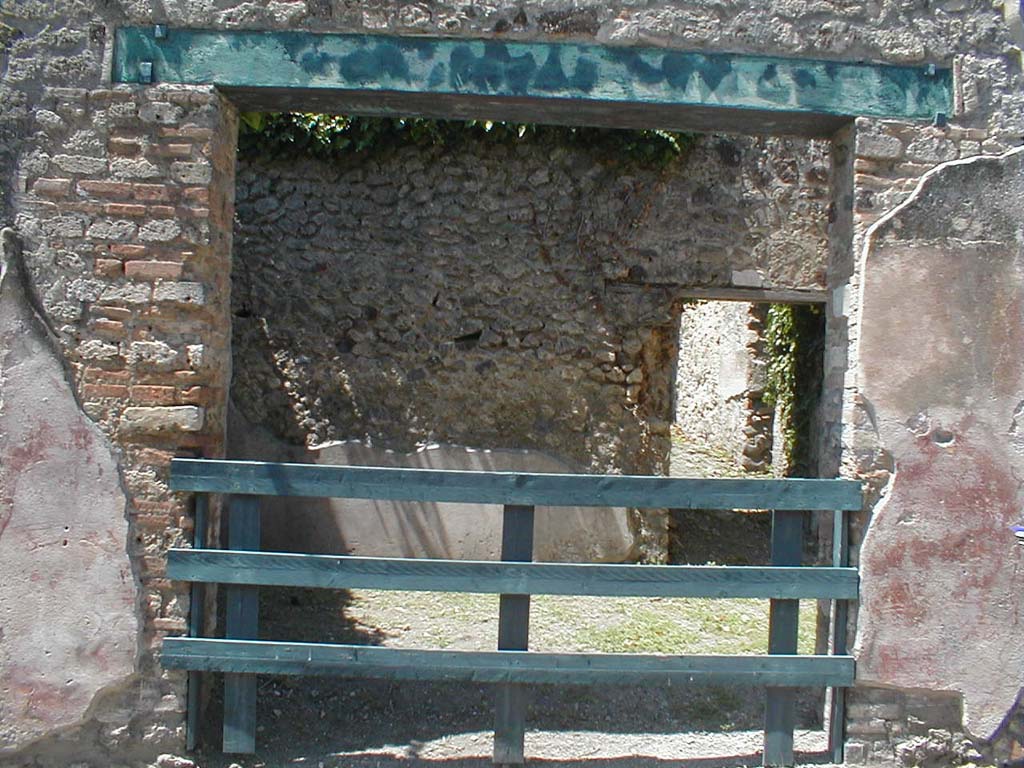 VI.15.11 Pompeii. May 2005. Looking west to entrance doorway.