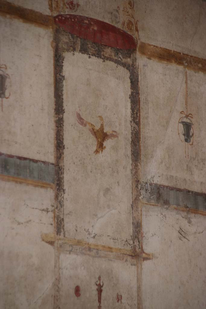 VI.16.7 Pompeii. September 2021. 
Detail of painted decoration from upper south wall in south-west corner. Photo courtesy of Klaus Heese.

