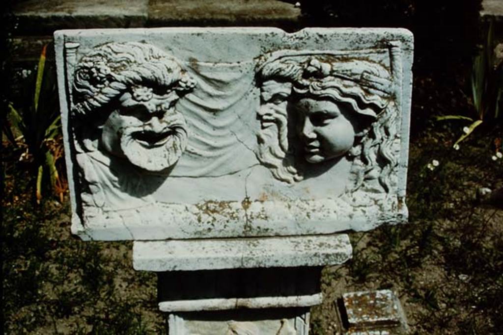 VI.16.7 Pompeii, 1968. Detail of marble relief with masks in peristyle garden, room F.
Photo by Stanley A. Jashemski.
Source: The Wilhelmina and Stanley A. Jashemski archive in the University of Maryland Library, Special Collections (See collection page) and made available under the Creative Commons Attribution-Non Commercial License v.4. See Licence and use details. J68f0203
