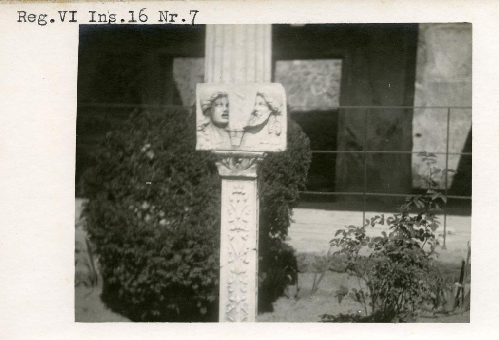 VI.16.7 Pompeii. Pre-1937-39. Marble relief of two theatrical masks on a richly decorated pilaster of ivy and fruit.
Photo courtesy of American Academy in Rome, Photographic Archive. Warsher collection no. 496.
