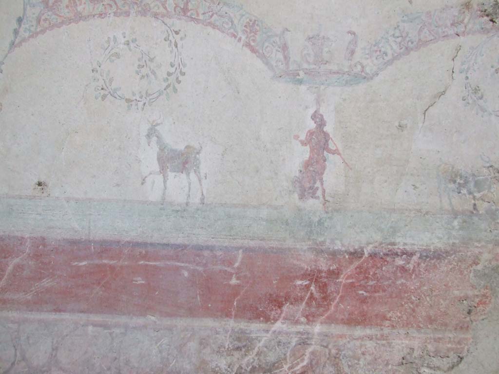 VI.16.15 Pompeii. December 2006. West wall of tablinum D, showing detail of wall painting of figure and two goats.