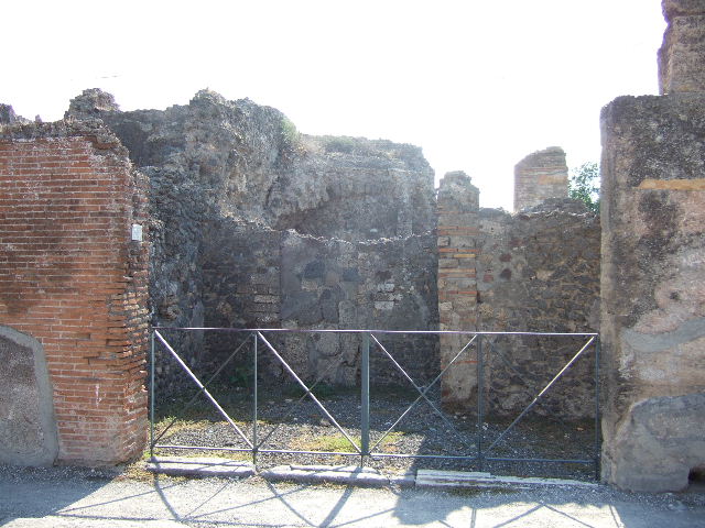 VI.17.33 Pompeii. May 2011. West wall with blocked doorway. Photo courtesy of Michael Binns.