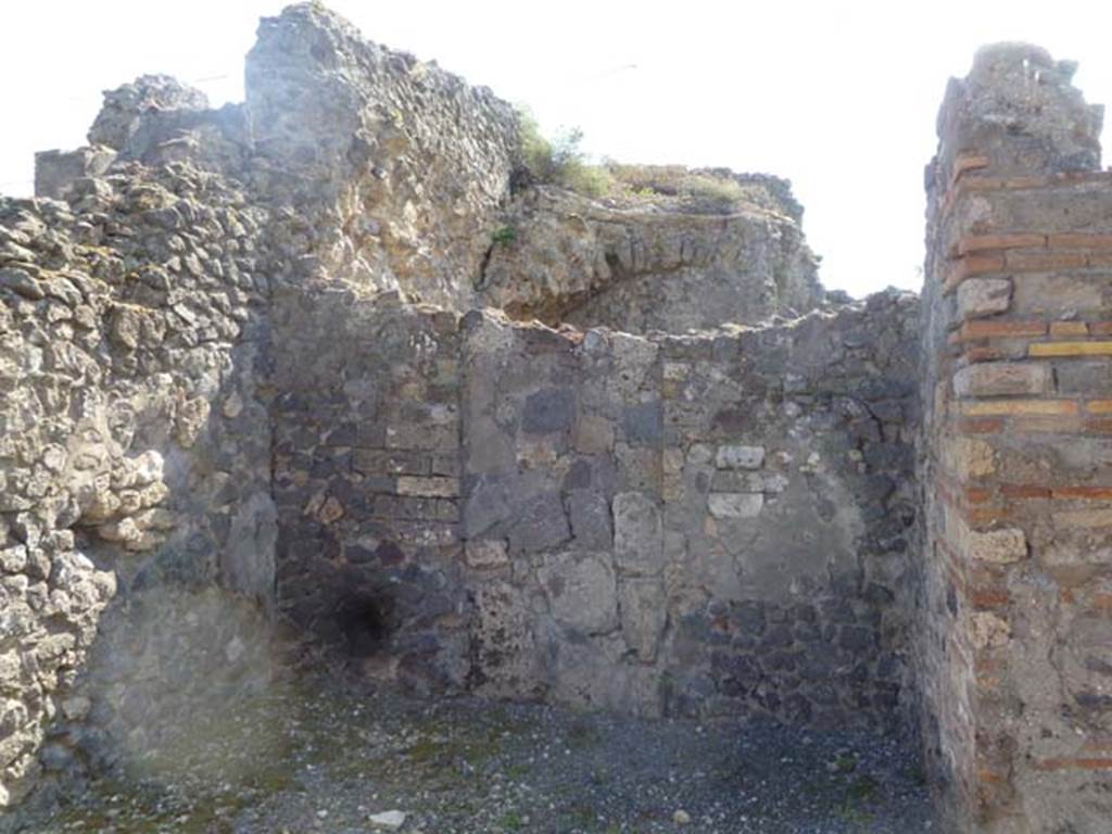 VI.17.33 Pompeii. May 2011. West wall with blocked doorway. Photo courtesy of Michael Binns.