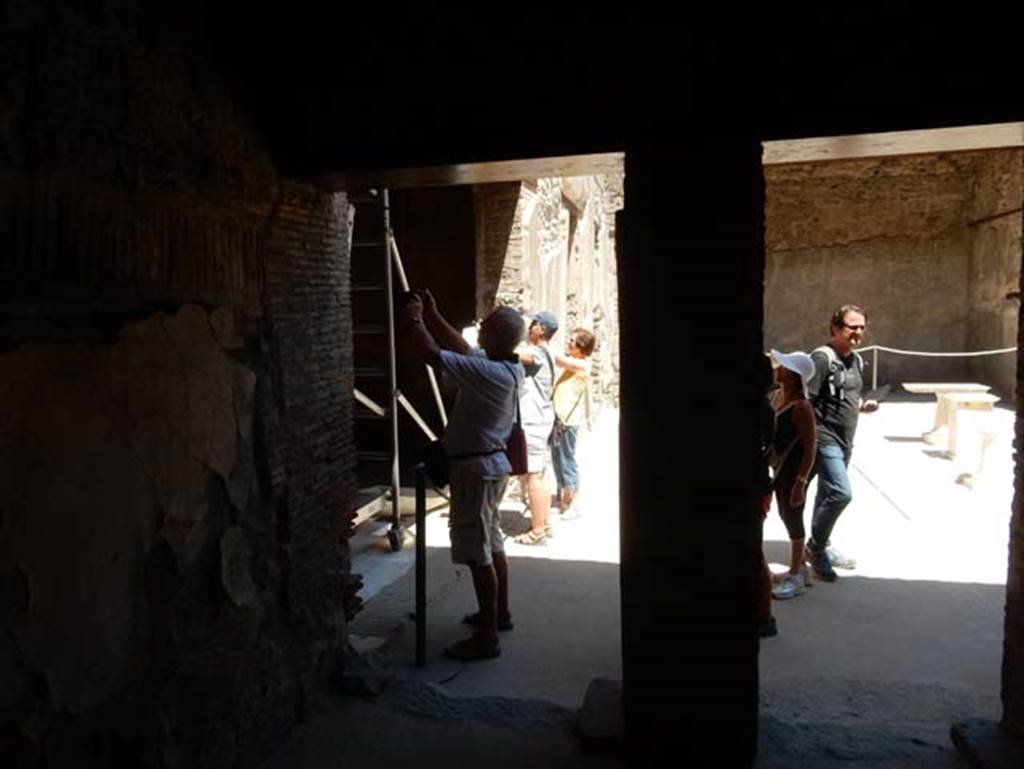 VII.1.47 Pompeii. May 2017. Looking east across atrium 3 towards tablinum 6, from room 11 on west side.
Centre left is the entrance doorway to Exedra 10. Photo courtesy of Buzz Ferebee.

