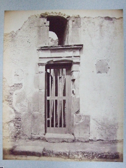 VII.1.48 Pompeii. December 2006. Looking east through small doorway of Stabian Baths.  