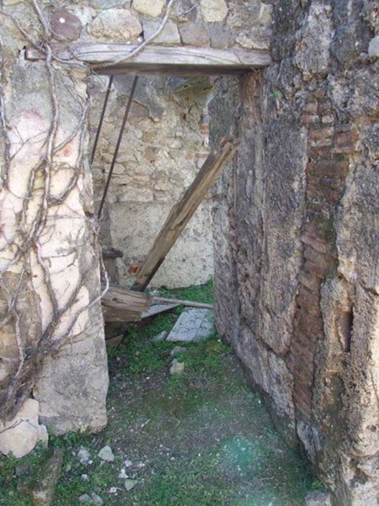 VII.2.16 Pompeii.  March 2009.   Small door on south wall of Room 10, leading to vestibule of corridor Room 11.
