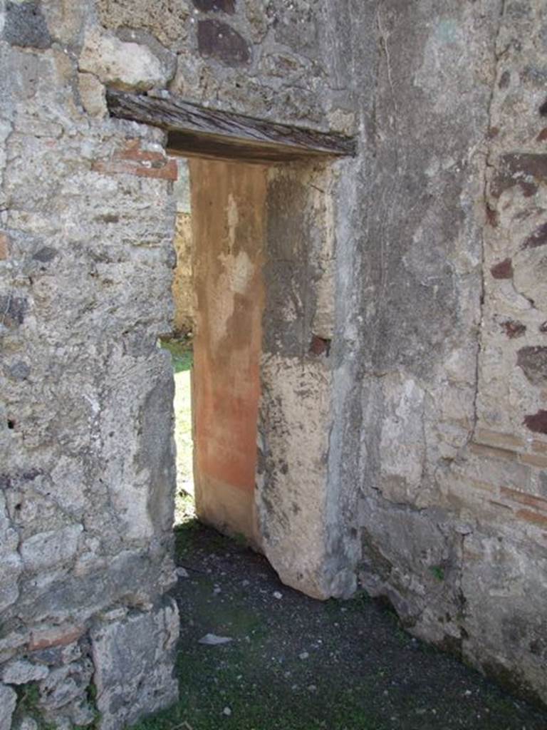 VII.2.16 Pompeii. March 2009. Room 2, atrium. South-east corner of atrium, with small doorway to room 3, oecus.
