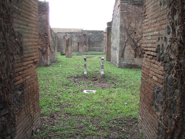 VII.2.18 Pompeii. March 2009. Doorway to room 3, cubiculum, and east side of atrium, with doorways to room 4 and ala.
