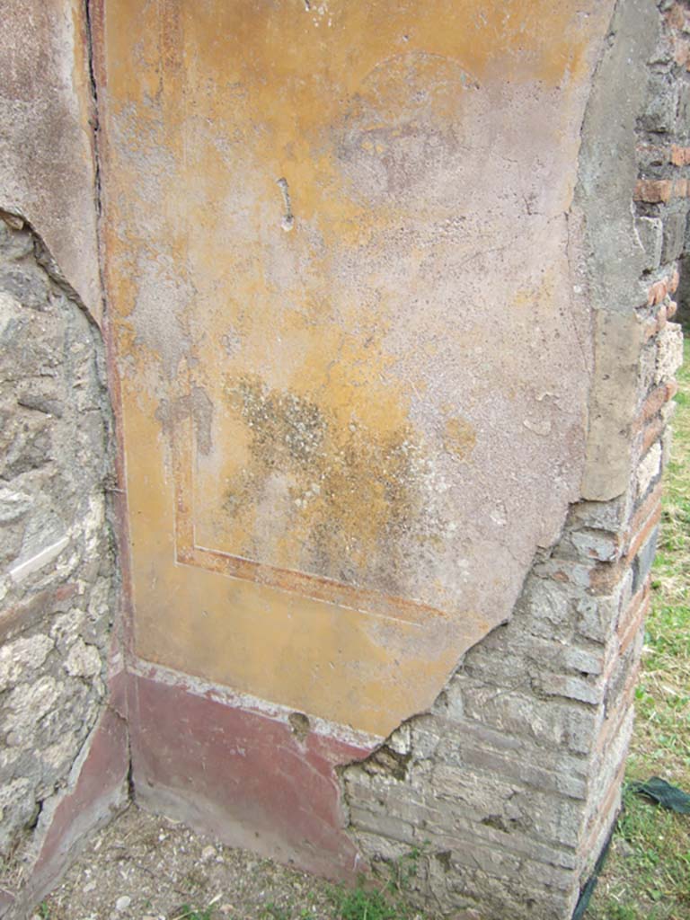 VII.2.38 Pompeii. May 2006. Painted south side of blocked doorway on east side of atrium.