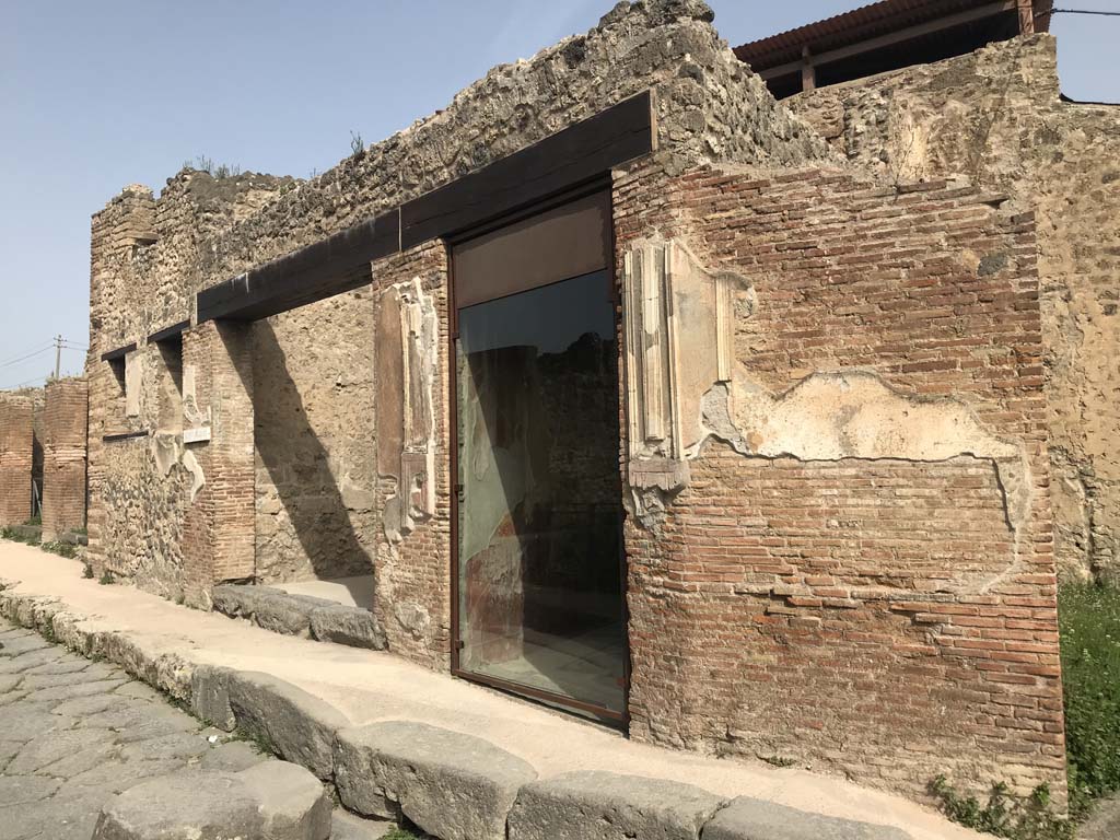 VII.2.44, centre left, and VII.2.45, centre right, Pompeii. April 2019. 
Looking west along front faade on Via degli Augustali, from near VII.2.45.  Photo courtesy of Rick Bauer.
