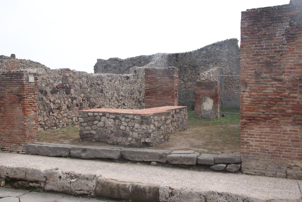 VII.3.9 Pompeii. October 2023. Looking south-east towards entrance doorway on Via della Fortuna. Photo courtesy of Klaus Heese.