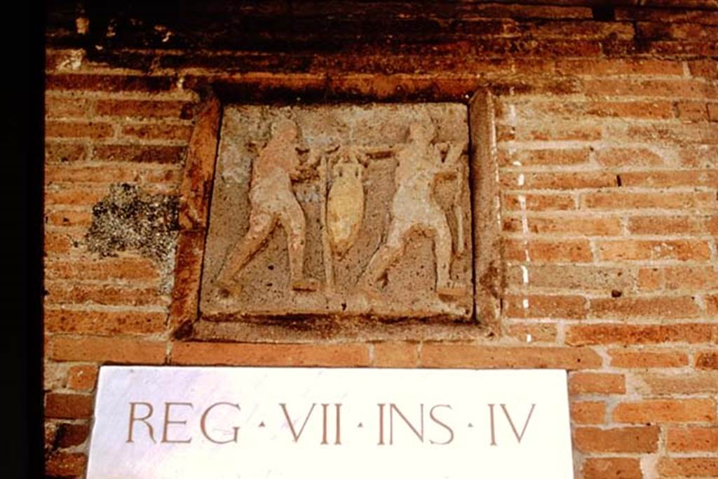 VII.4.16 Pompeii. October 2001. Plaque on west corner pilaster. Photo courtesy of Peter Woods. 
