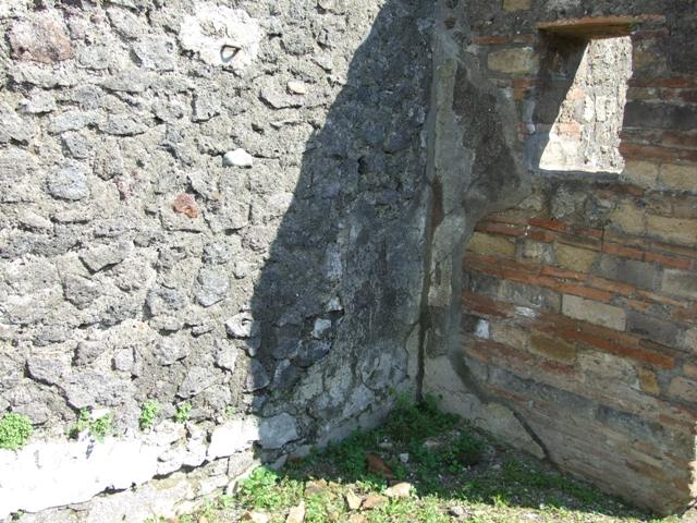 VII.4.29 Pompeii.  March 2009. Looking north from rear of shop.