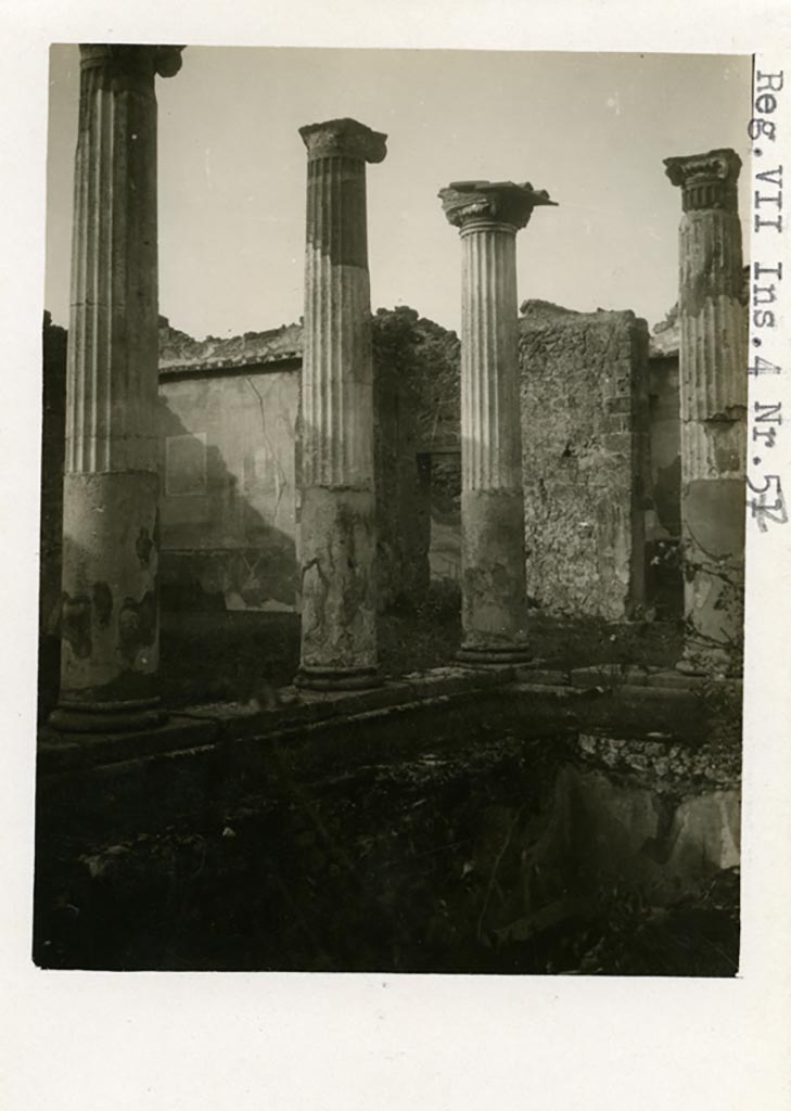 VII.4.31/51 Pompeii but shown as VII.4.57 on photo. Pre-1937-39. 
Looking north-west across middle peristyle towards north wall of room 20, on left.
Doorway to room 21, in centre.
Photo courtesy of American Academy in Rome, Photographic Archive. Warsher collection no. 1462.

