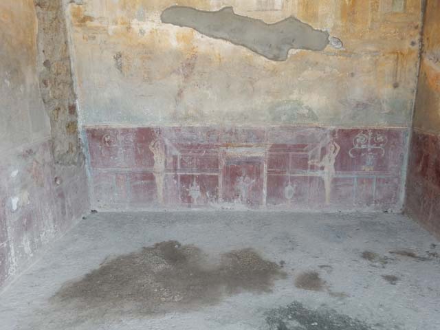 VII.4.48 Pompeii. December 2007. Room 14. Cubiculum. West wall.
Wall painting of a winged cherub.