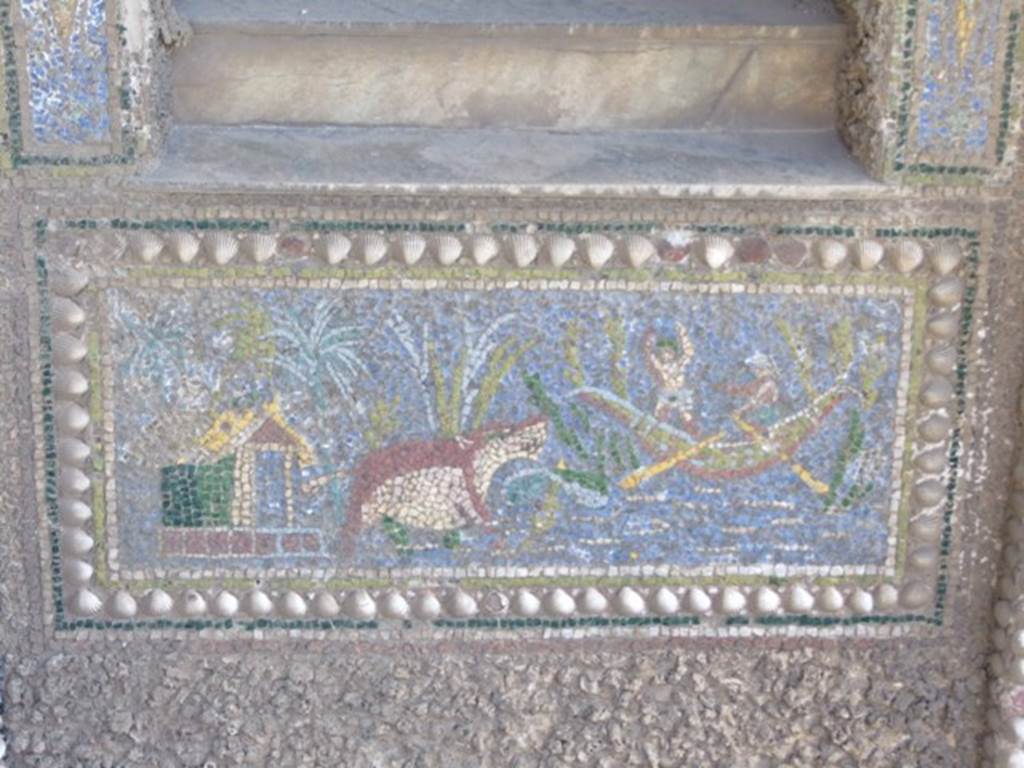 VII.4.56 Pompeii. March 2009. Mosaic panel of a Nile scene of two men in a boat fighting off a hippopotamus.